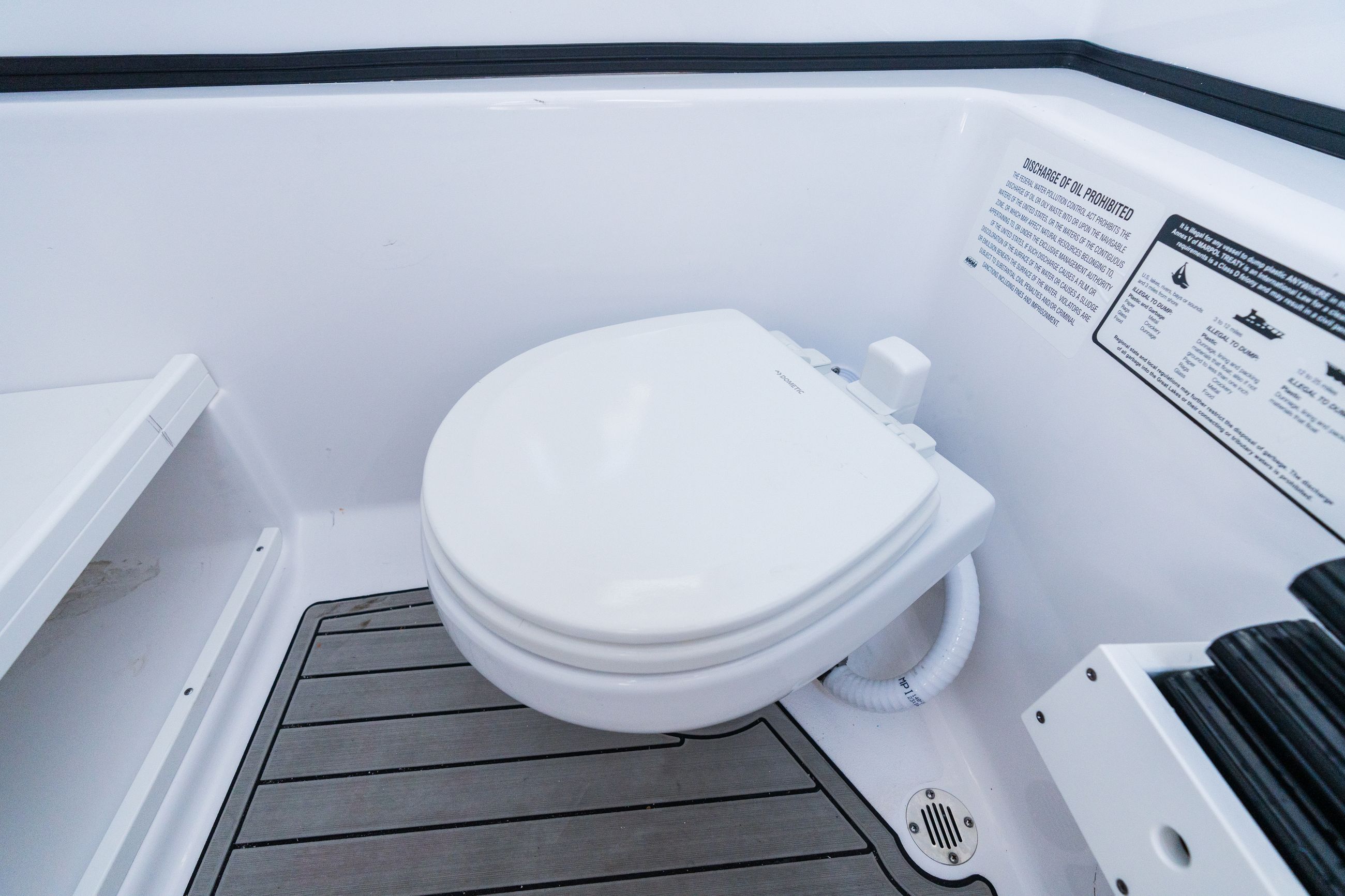 Detail image of Electric Porcelain Toilet w/ Discharge