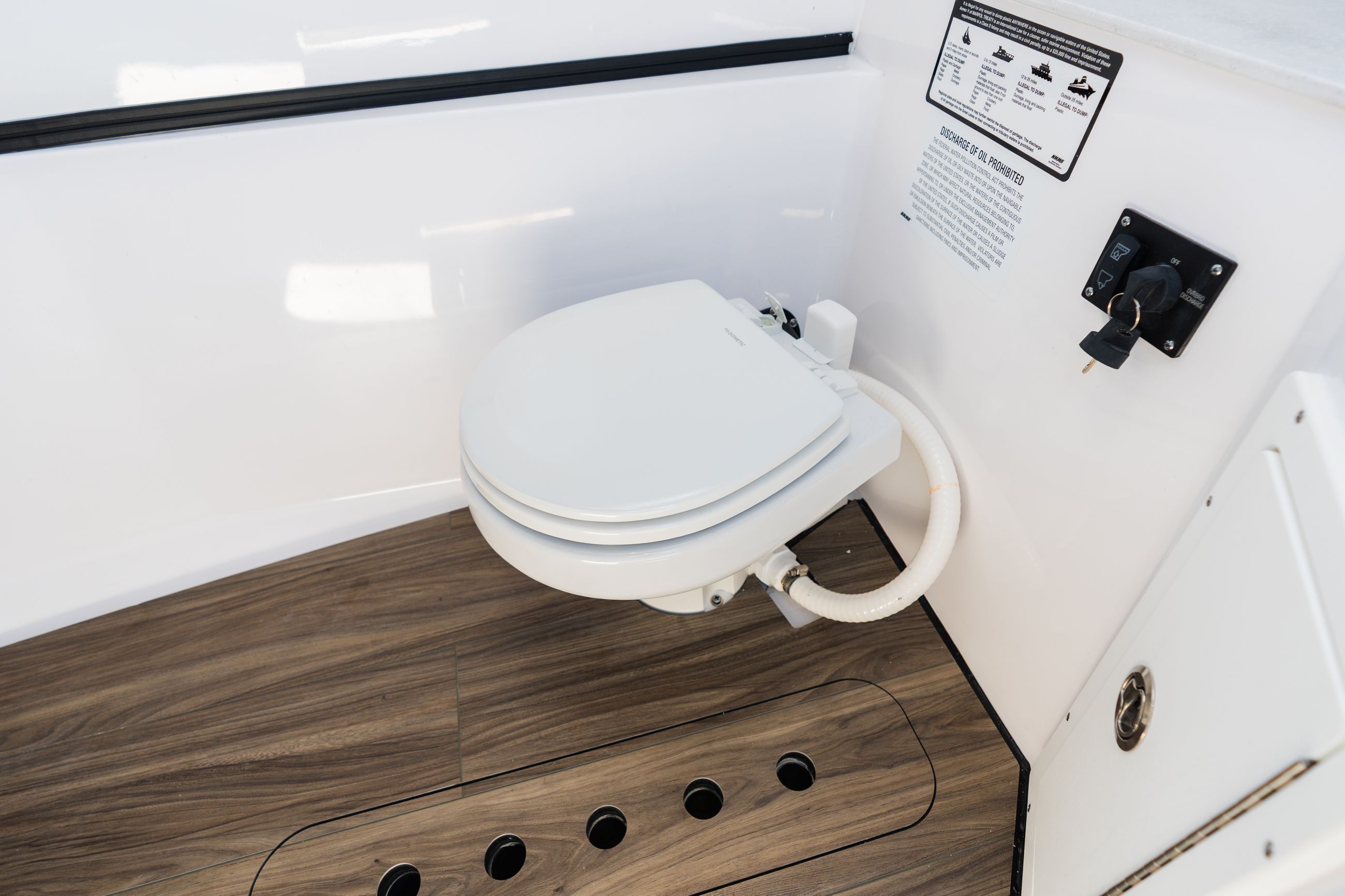 Detail image of Electric Porcelain Toilet w/ Discharge