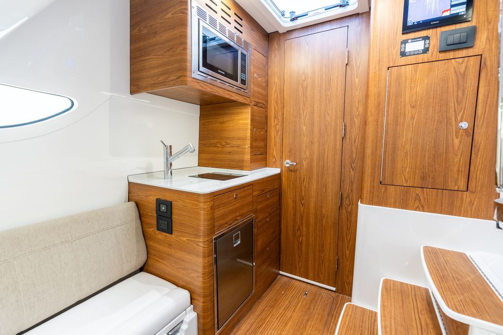 Detail image of Full Galley w/ Microwave, Cooktop & Refrigerator