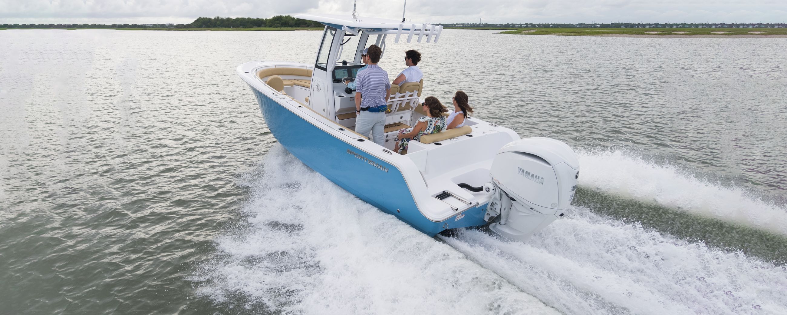 The Open 232 running on the water with the showing off the Seakeeper system.
