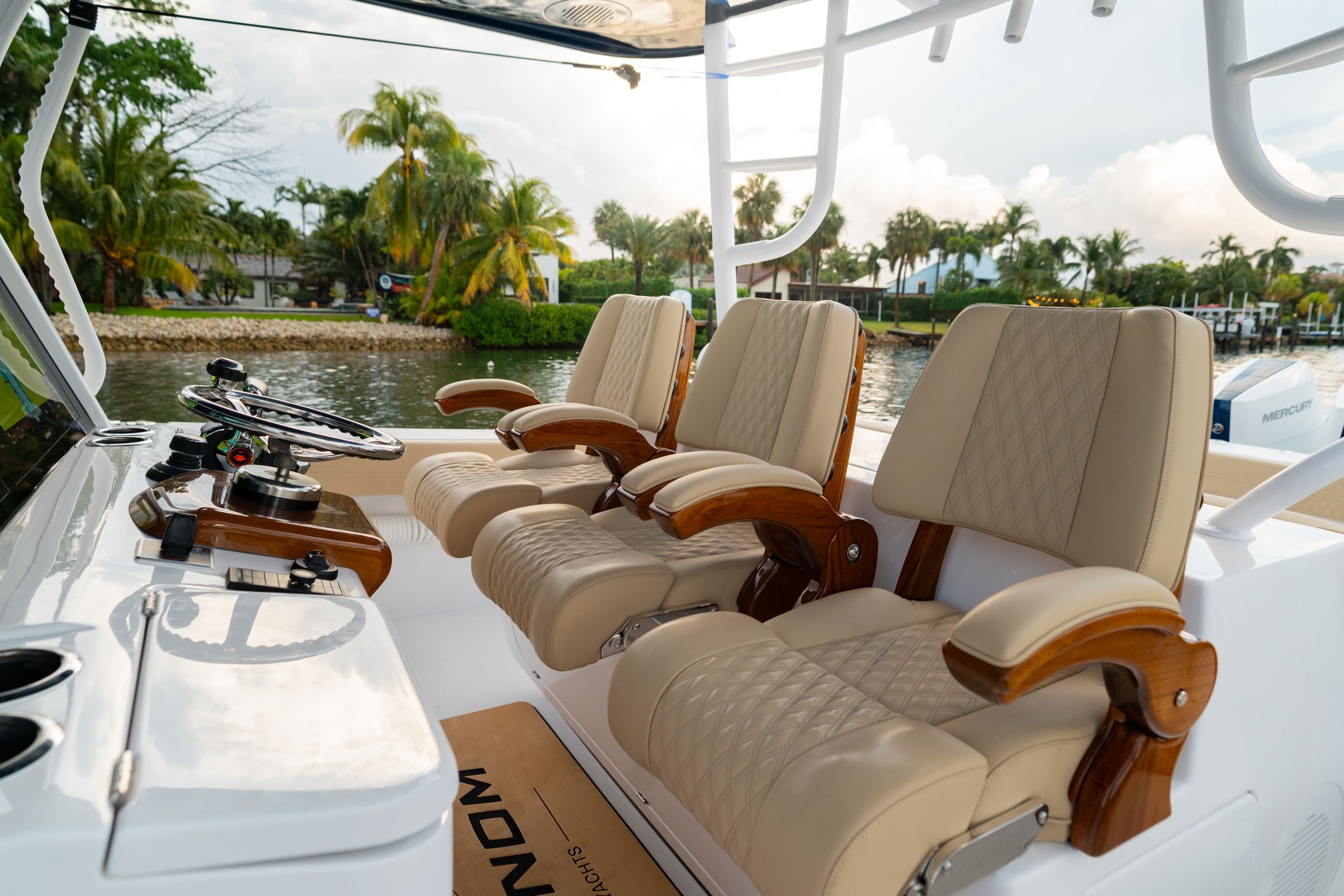 Large detail image of the Triple Phenom Premium Captain’s Chairs